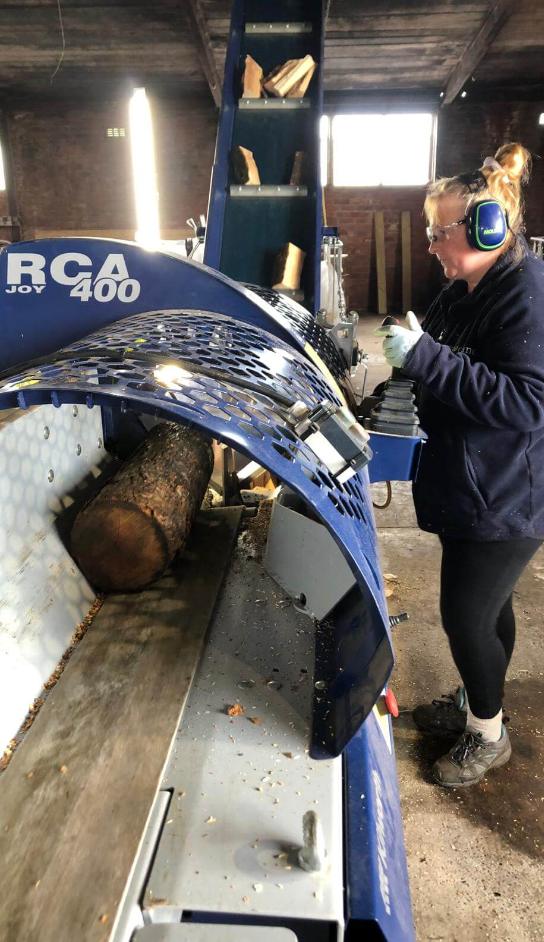 Splitting logs on the RCA 400 at the yard